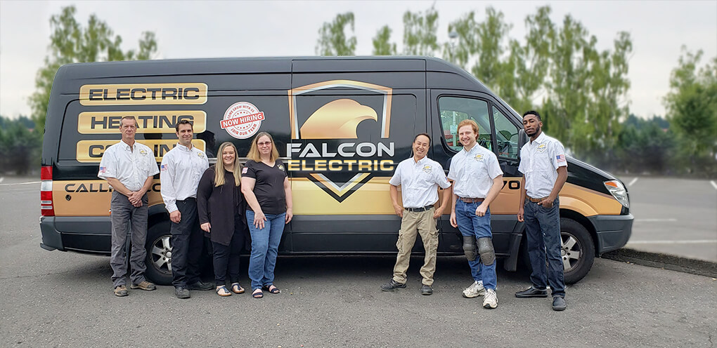 staff in front of van